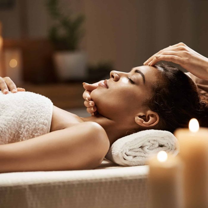 attractive-african-woman-enjoying-face-massage-spa-salon-scaled attractive-african-woman-enjoying-face-massage-spa-salon-scaled